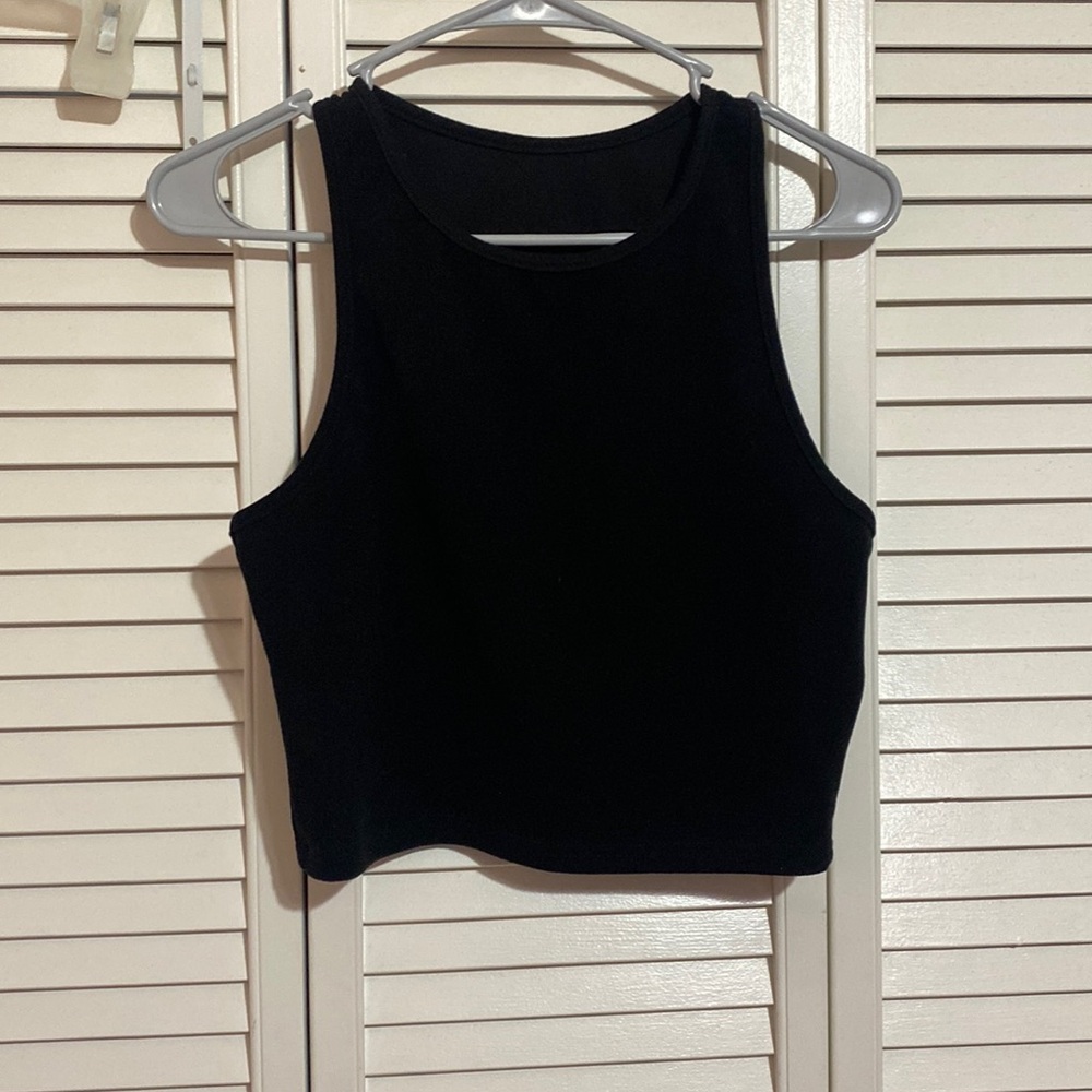 Woman’s black tank top